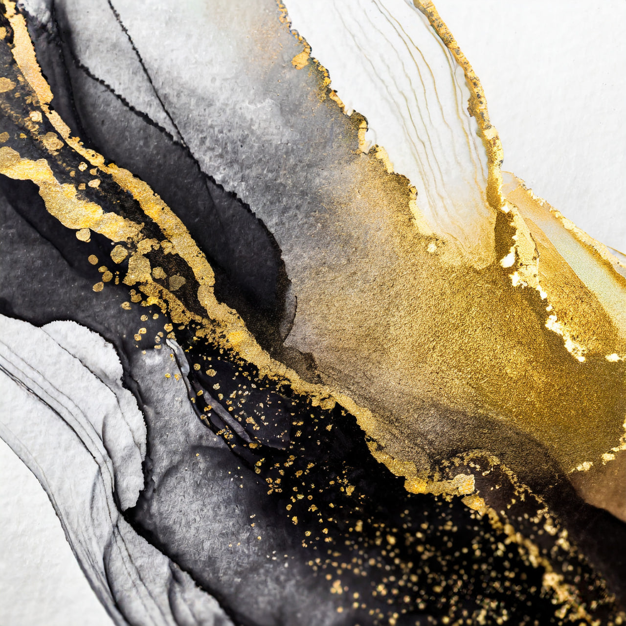 Abstract art with gold and black strokes on a white background